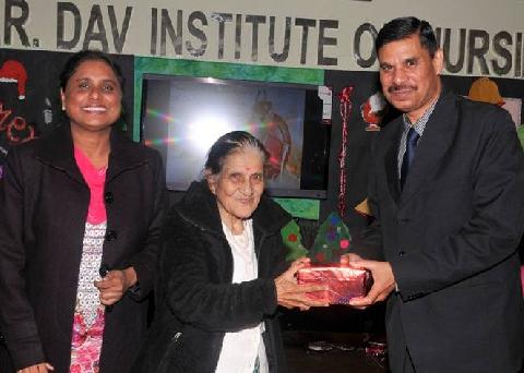 X-Mas Gift gifted by Honorable Chief Guest Mrs. Zeenat Williams and Respected Principal Madam Mrs. Veena Williams to 
Respected Sir Mr. Davidson Williams